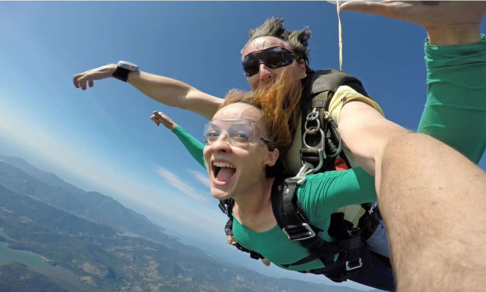 Solo trip ideas for valentine's day: Sky diving tandem self portrait