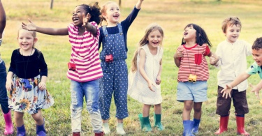 Group of Diverse Kids Playing at the park together in las vegas