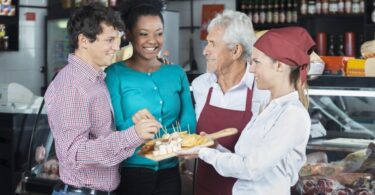 people tasting food samples