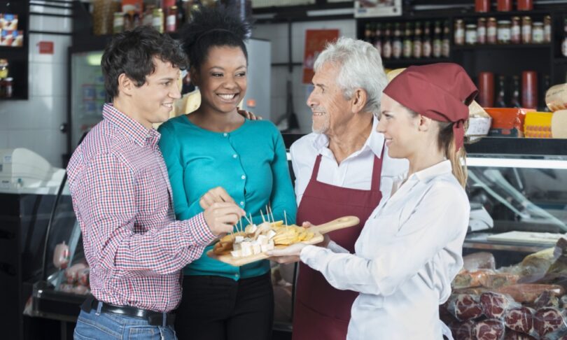 people tasting food samples