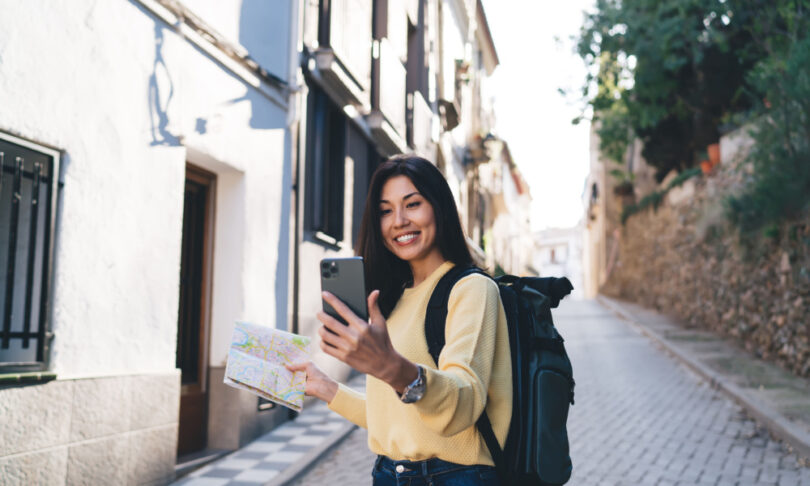 solo tourist traveling with phone