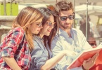 http://www.shutterstock.com/pic-220326907/stock-photo-group-of-students-two-girls-and-one-boy-studying-with-interest-on-a-book.html?src=zdcZYO14N5DcLqiyLWng_Q-1-9