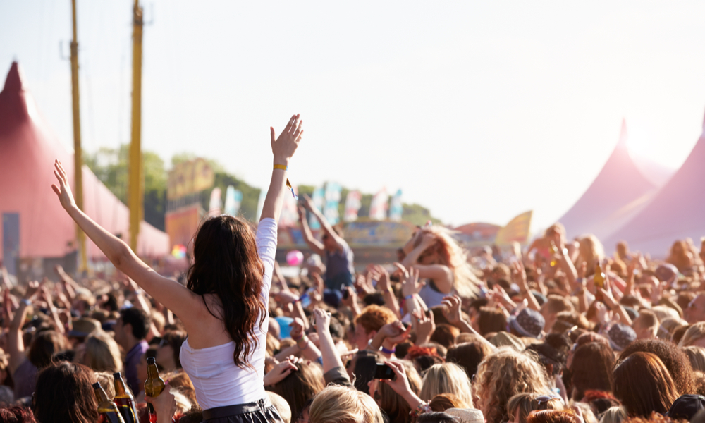 Crowds Enjoying Themselves At Outdoor Music Festival 