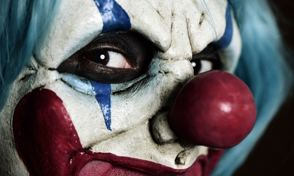 closeup of a scary evil clown