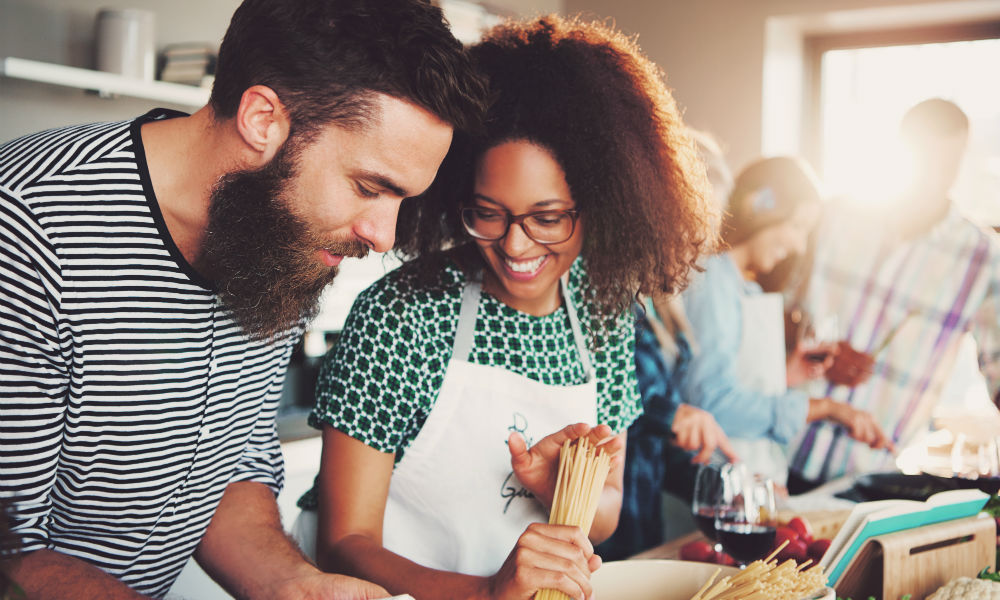 people-having-fun-cooking-in-the-kitchen