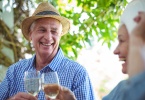 retired couple drinking wine