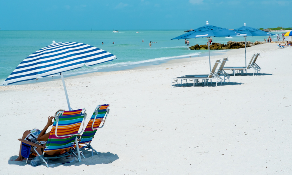 Beach Chairs and Umbrellas at a Beach Resort in Naples Florida, USA