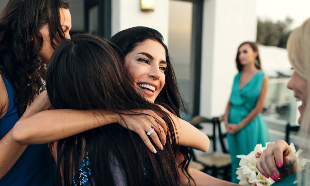 Guests congratulating bride