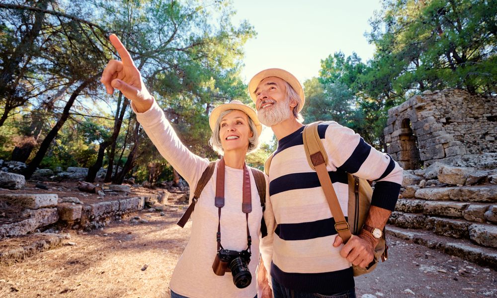 an elderly couple revisiting old family home