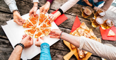 friends eating pizza