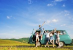 Young hipster friends on road trip on a summers day