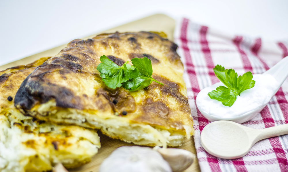 Cheese burek with parsley, garlic and whipped cream 