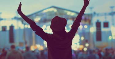 Girl enjoying the music festival / concert.