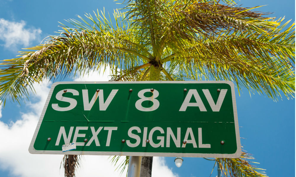 Street sign marking the 8th street in Little Havana, a focal point of the cuban community in Miami