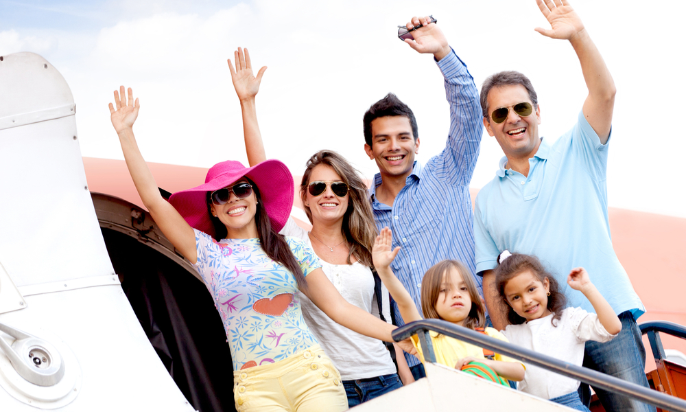 family boarding airplane