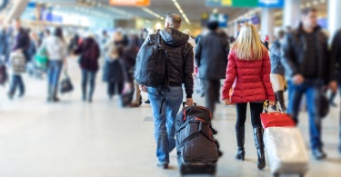 couple walking in an airport