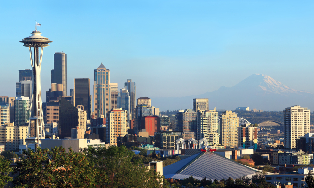 A view of the city of Seattle skyline and Mt. Rainier at sunset.