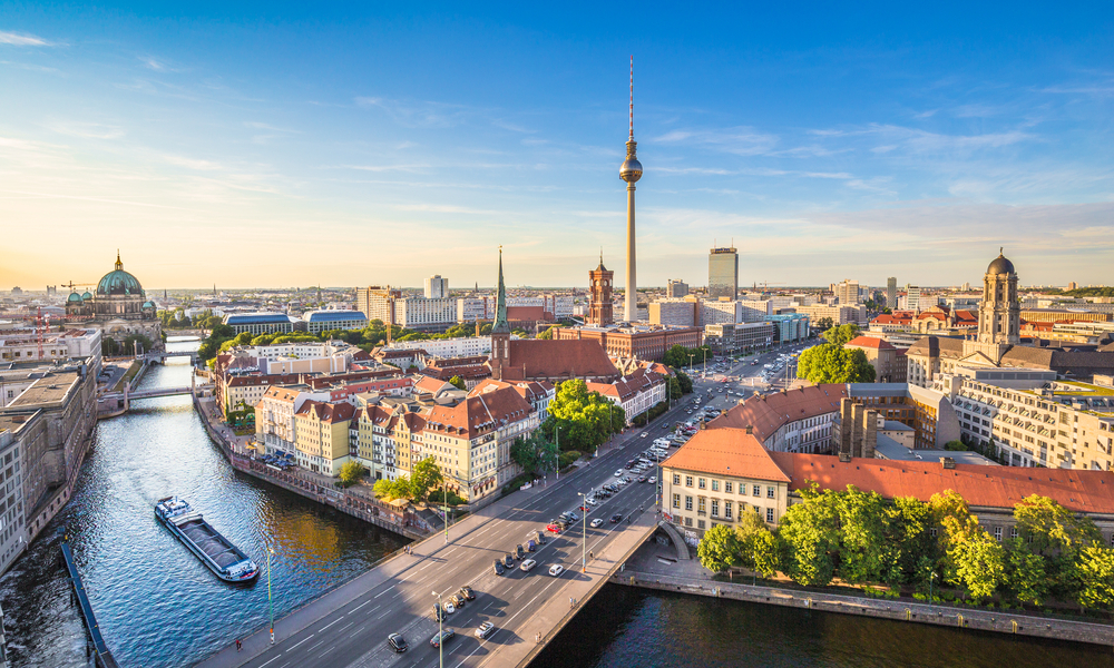 Aerial view of Berlin skyline and Spree river in beautiful evening light at sunset in summer, Germany