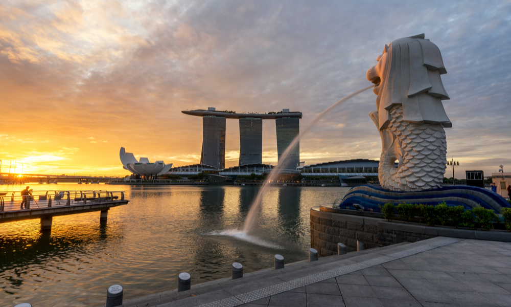 Sunset of Singapore Skyline. Singapore`s business district, blue sky and night view for marina bay