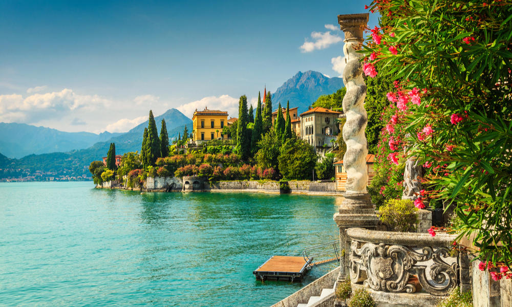 Famous luxury villa Monastero, stunning botanical garden decorated with mediterranean oleander flowers, lake Como, 