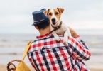 man holding dog