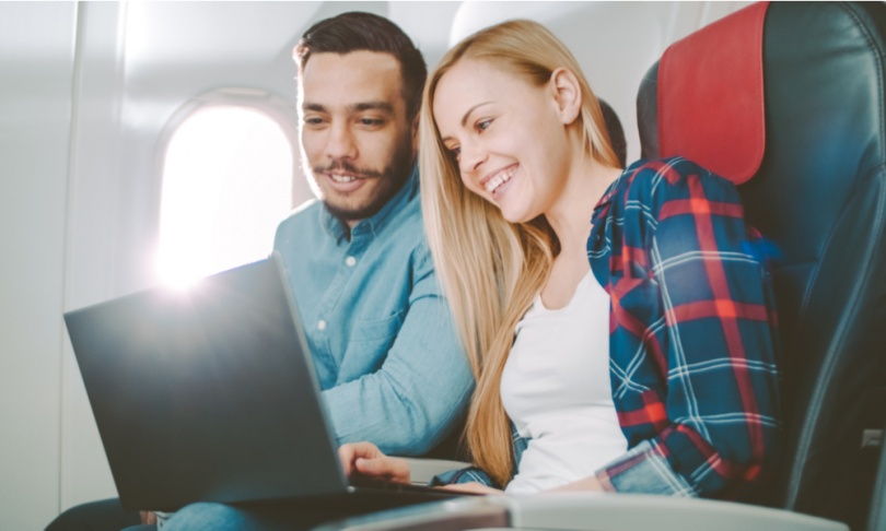 Couple Watching Movie on Flight