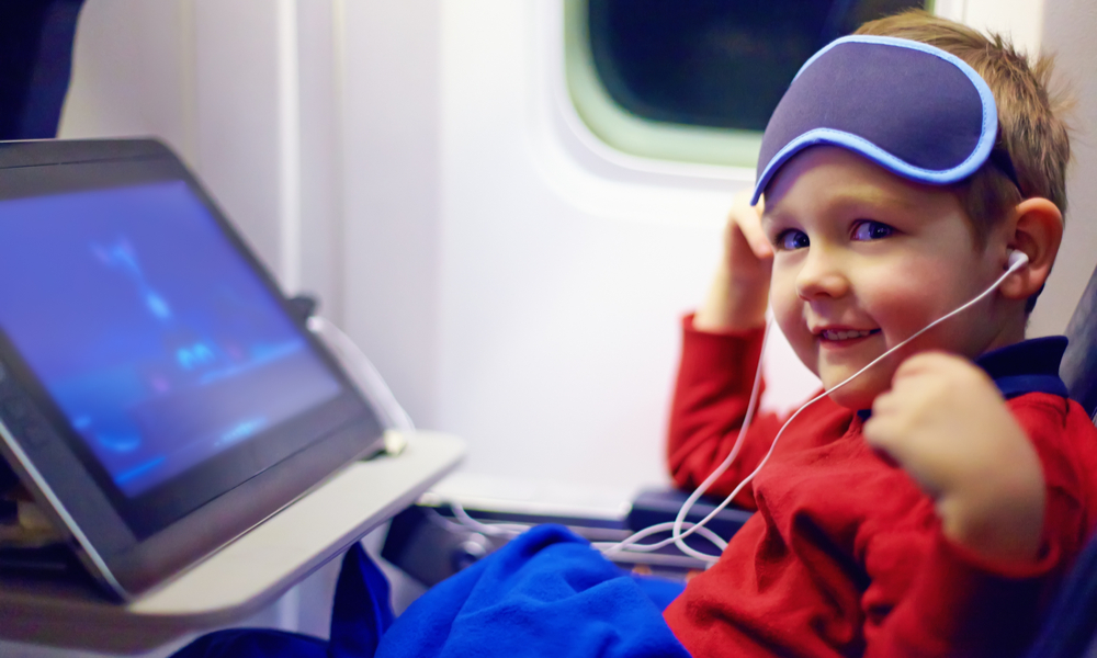 Kid Watching Show On Plane