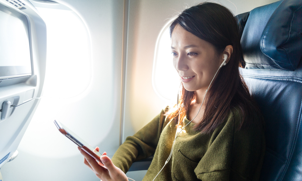 Woman Smiling on Flight