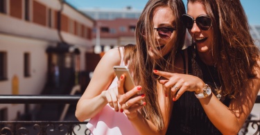 Girls Looking at Phone