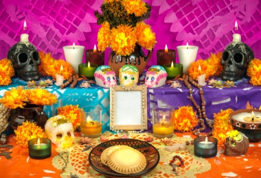 Best Places to Celebrate Day of the Dead in America: Day of the dead altar with sugar skulls