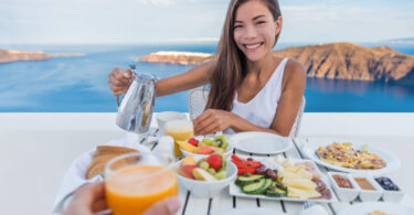 Woman eating healthy travel meal