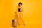 Woman in yellow outfit at airport