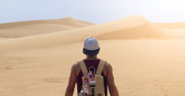 Backpacker exploring a desert