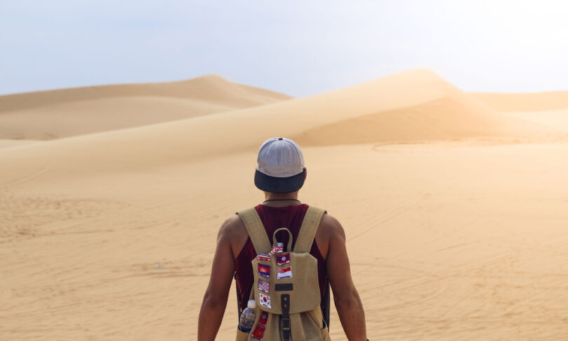 Backpacker exploring a desert