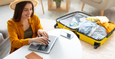 Woman celebrating National Plan for Vacation Day