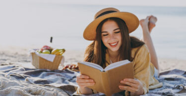 Girl reading in the beach