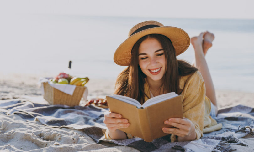 Girl reading in the beach