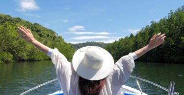 woman enjoying a river cruise