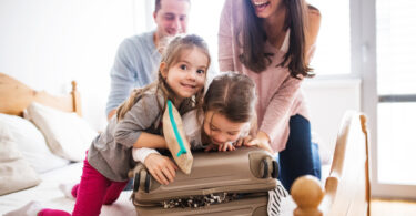 Family packing luggage