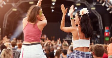 Two girls enjoying a music festival